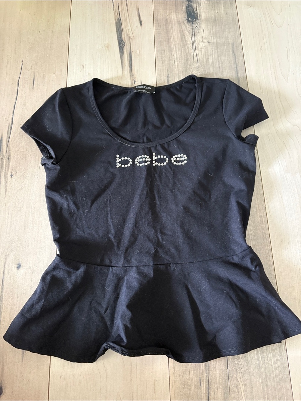 Vintage BEBE Black Short Sleeve Peplum Top with Signature Rhinestone Logo